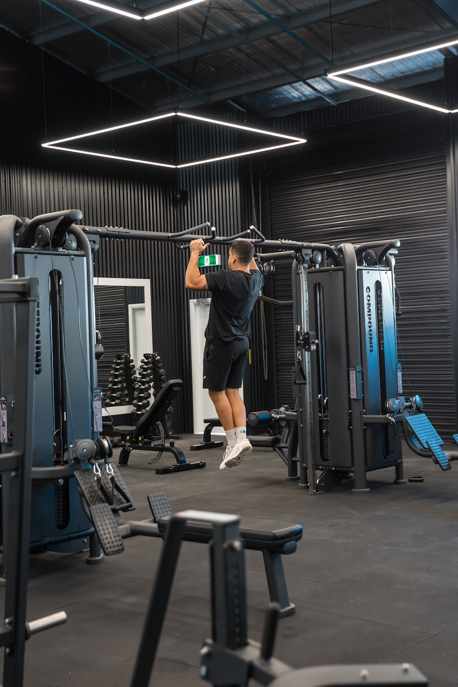 Cable towers and functional floor in a 24/7 gym fitout by Compound Fitness